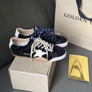 Golden Goose Black and White Star Sneakers